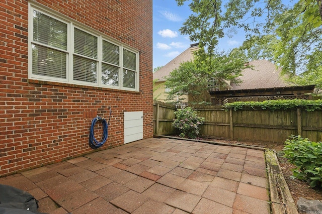 4109 Valley View Dr, Little Rock, AR 72212 - view of patio / terrace featuring fence and a garage