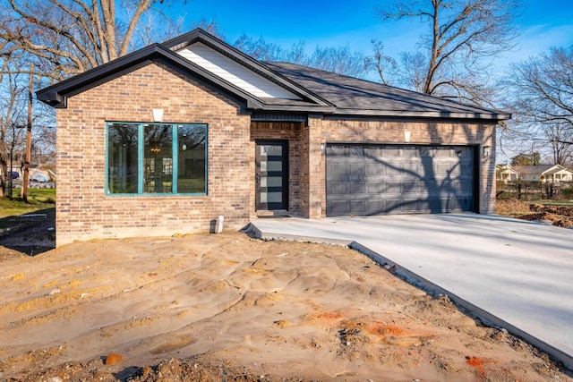 2919 Martel Ave, Little Rock, AR 72206 - single story home with a garage, concrete driveway, and brick siding