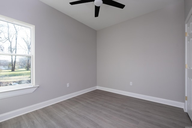 2919 Martel Ave, Little Rock, AR 72206 - empty room featuring baseboards, a ceiling fan, wood finished floors, and vaulted ceiling