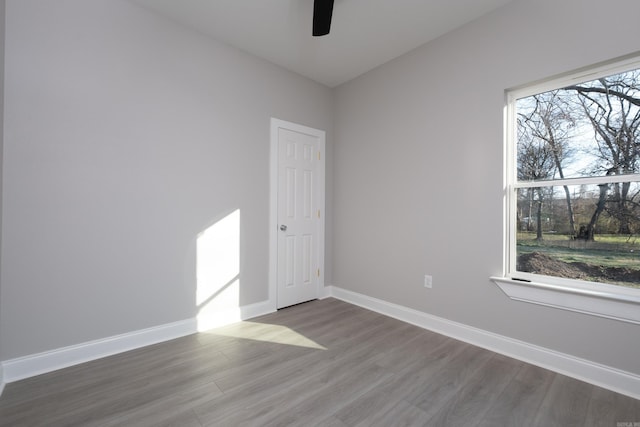 2919 Martel Ave, Little Rock, AR 72206 - empty room with baseboards, ceiling fan, and wood finished floors