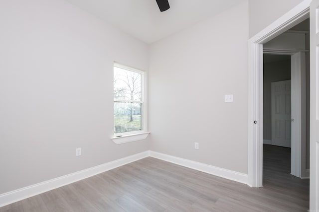 2919 Martel Ave, Little Rock, AR 72206 - unfurnished room featuring a ceiling fan, baseboards, and light wood-style floors