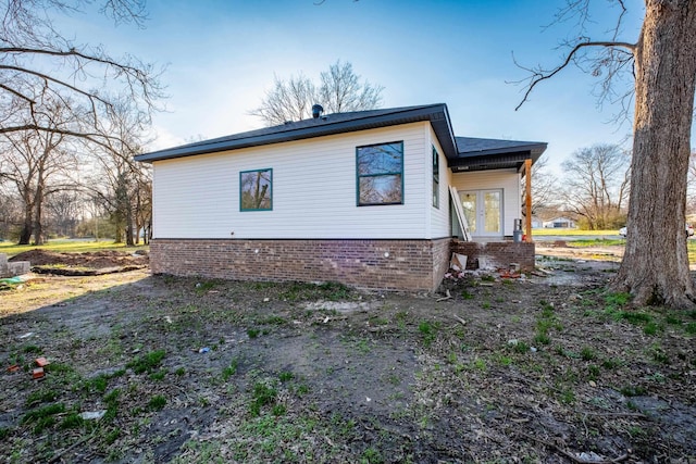2919 Martel Ave, Little Rock, AR 72206 - view of side of home with french doors and brick siding