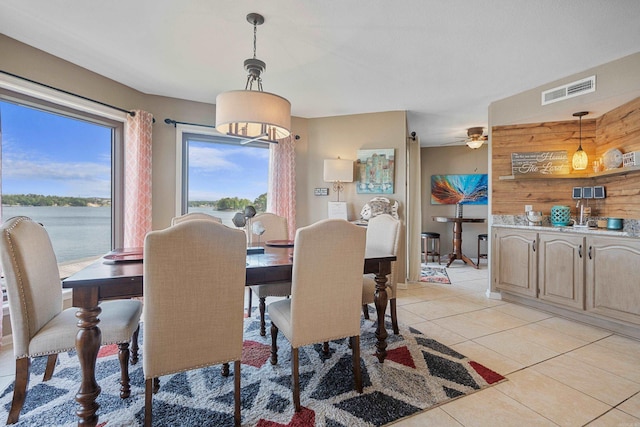 101 Long Island Dr, Hot Springs, AR 71913 - dining room featuring a water view, visible vents, and light tile patterned floors