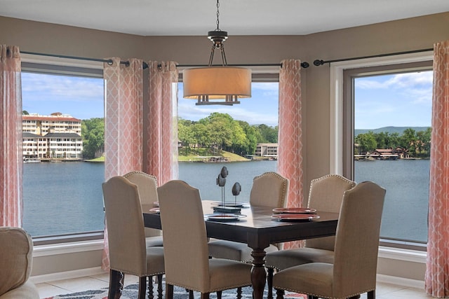 101 Long Island Dr, Hot Springs, AR 71913 - dining room with baseboards, a water view, and light tile patterned flooring
