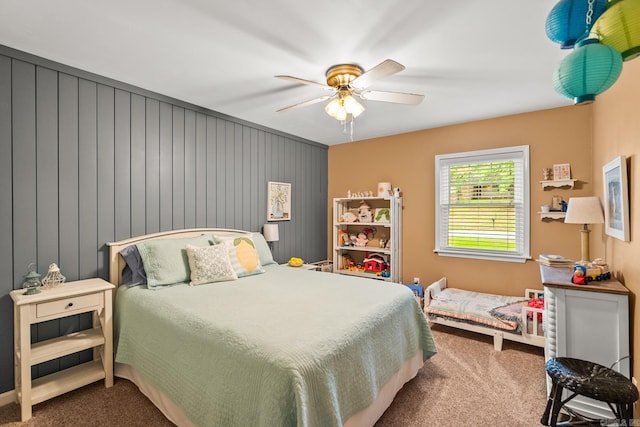 bedroom with ceiling fan and carpet