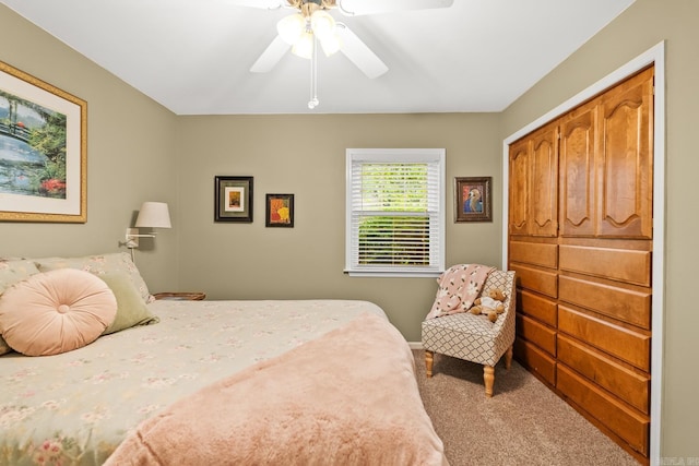 bedroom featuring carpet floors, ceiling fan, and a closet