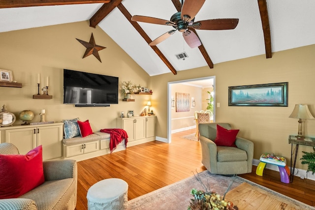 3 E Lake Dr, North Little Rock, AR 72116 - living room with ceiling fan, beamed ceiling, light wood finished floors, and visible vents