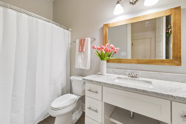 bathroom featuring toilet, a shower with curtain, and vanity