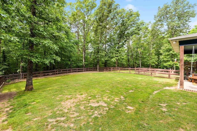 view of yard with a fenced backyard