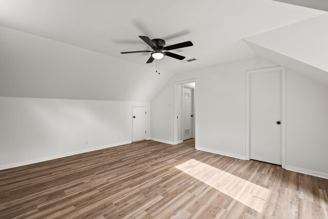 22 Colony Rd, Little Rock, AR 72227 - additional living space featuring ceiling fan, visible vents, wood finished floors, baseboards, and lofted ceiling