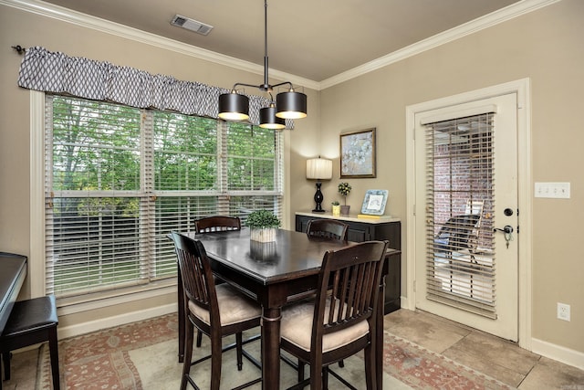 26 Epernay Cir, Little Rock, AR 72223 - dining room with baseboards, visible vents, and ornamental molding