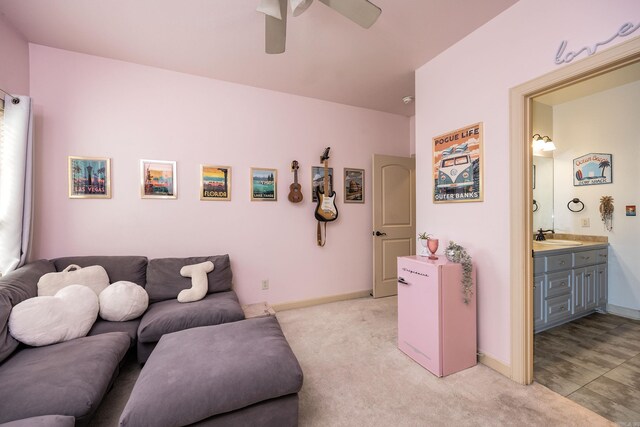 26 Epernay Cir, Little Rock, AR 72223 - living area with baseboards, a ceiling fan, light carpet, and indoor wet bar