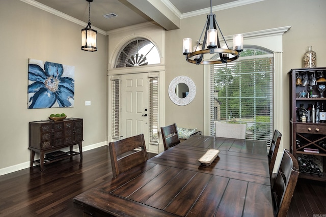 26 Epernay Cir, Little Rock, AR 72223 - dining area with crown molding, a notable chandelier, baseboards, dark wood-type flooring, and visible vents
