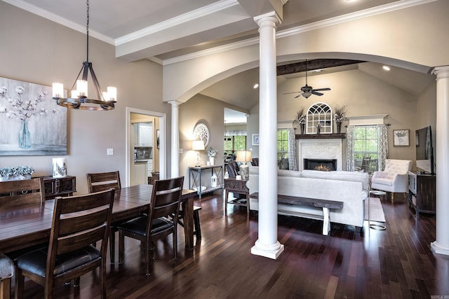 26 Epernay Cir, Little Rock, AR 72223 - dining room featuring dark wood-style flooring, a fireplace, ornate columns, arched walkways, and ceiling fan with notable chandelier