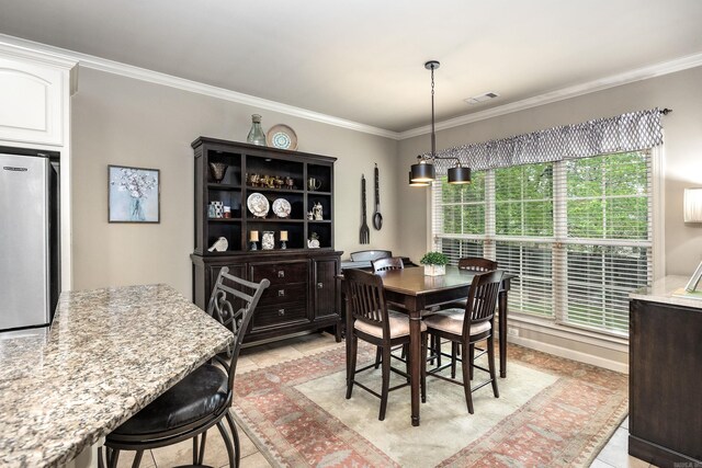 26 Epernay Cir, Little Rock, AR 72223 - dining area featuring visible vents, ornamental molding, and light tile patterned flooring