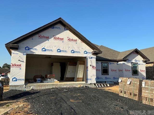 property under construction with a garage