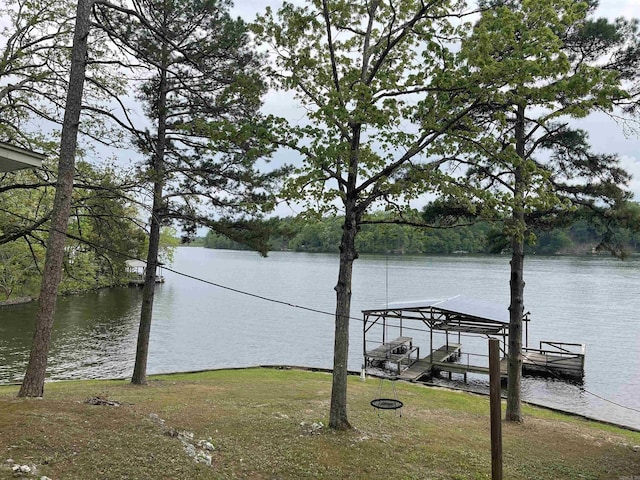 dock area featuring a water view