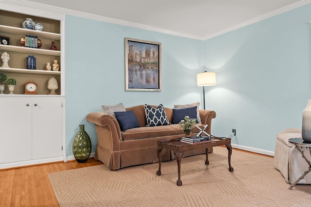 416 Ivory Dr, Little Rock, AR 72205 - living area featuring baseboards, ornamental molding, and light wood finished floors