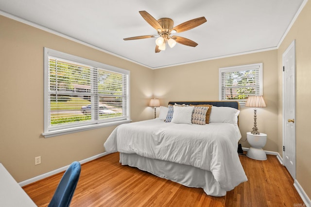416 Ivory Dr, Little Rock, AR 72205 - bedroom with baseboards, ornamental molding, and wood finished floors