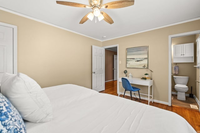 416 Ivory Dr, Little Rock, AR 72205 - bedroom featuring ornamental molding, wood finished floors, baseboards, connected bathroom, and a ceiling fan