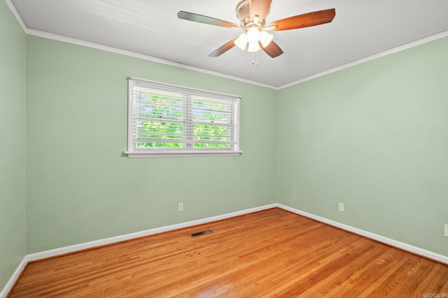 416 Ivory Dr, Little Rock, AR 72205 - unfurnished room with baseboards, ornamental molding, wood finished floors, and visible vents
