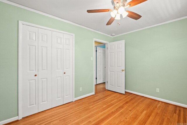 416 Ivory Dr, Little Rock, AR 72205 - unfurnished bedroom with ceiling fan, light wood-style floors, baseboards, ornamental molding, and a closet