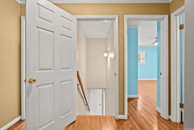 416 Ivory Dr, Little Rock, AR 72205 - hall with baseboards, an upstairs landing, and wood finished floors