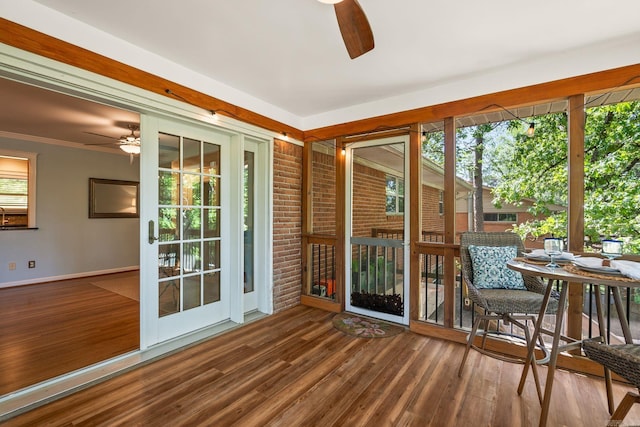 416 Ivory Dr, Little Rock, AR 72205 - unfurnished sunroom featuring baseboards, ceiling fan, and wood finished floors