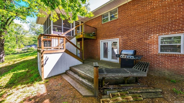 416 Ivory Dr, Little Rock, AR 72205 - rear view of house featuring french doors, stairs, a deck, and brick siding
