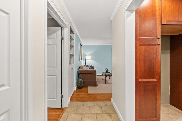 416 Ivory Dr, Little Rock, AR 72205 - hall with ornamental molding, light tile patterned floors, and built in shelves
