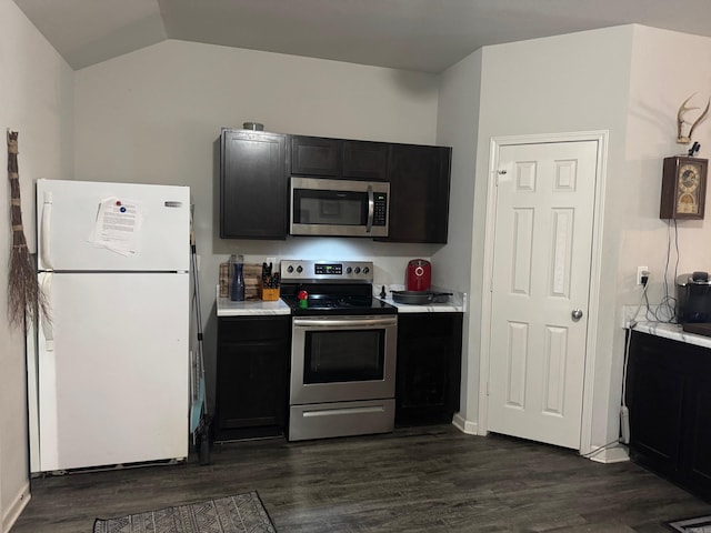 kitchen with light countertops, dark cabinets, stainless steel appliances, and dark wood-type flooring