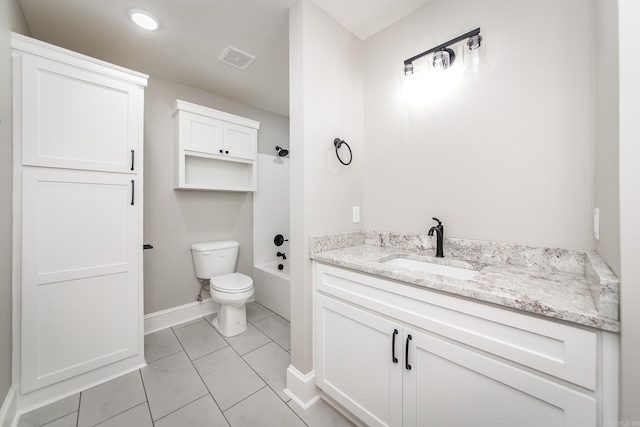 bathroom featuring visible vents, vanity, toilet, baseboards, and tile patterned floors