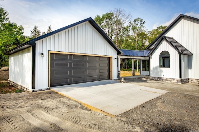 modern inspired farmhouse with board and batten siding and metal roof