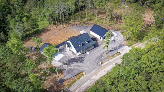 drone / aerial view with a forest view
