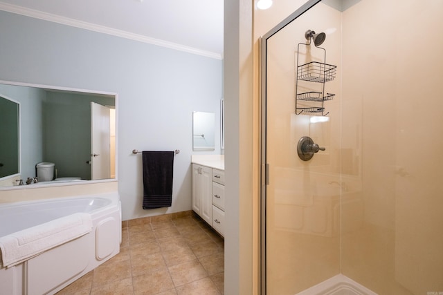 523 S Louisiana St Unit 10A, Little Rock, AR 72201 - bathroom with a bath, crown molding, a stall shower, vanity, and toilet