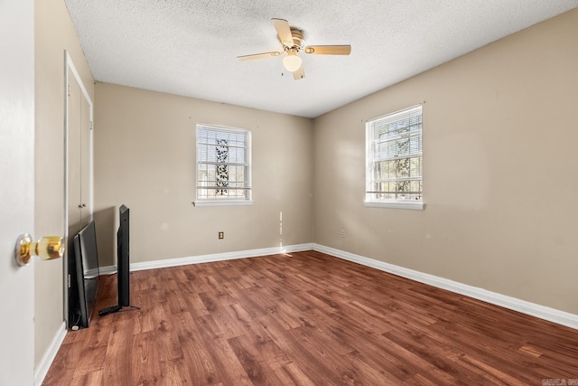 7510 Briarwood Dr, Little Rock, AR 72205 - interior space with baseboards, a ceiling fan, a textured ceiling, and wood finished floors