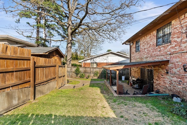 7510 Briarwood Dr, Little Rock, AR 72205 - view of yard with a fenced backyard and a patio area