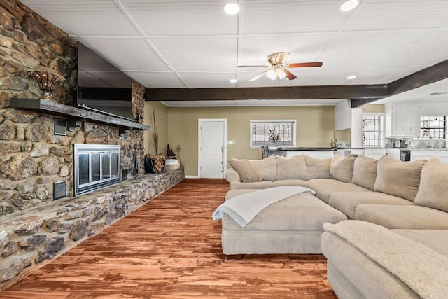 7510 Briarwood Dr, Little Rock, AR 72205 - living area featuring recessed lighting, a ceiling fan, wood finished floors, and a fireplace