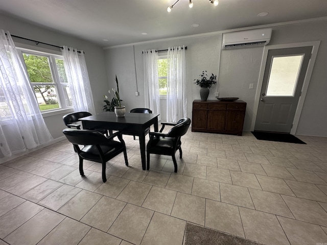 dining space featuring an AC wall unit, crown molding, and light tile patterned flooring