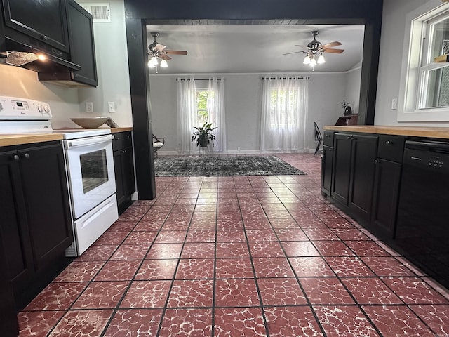 kitchen featuring dark cabinets, ceiling fan, butcher block countertops, and white electric stove
