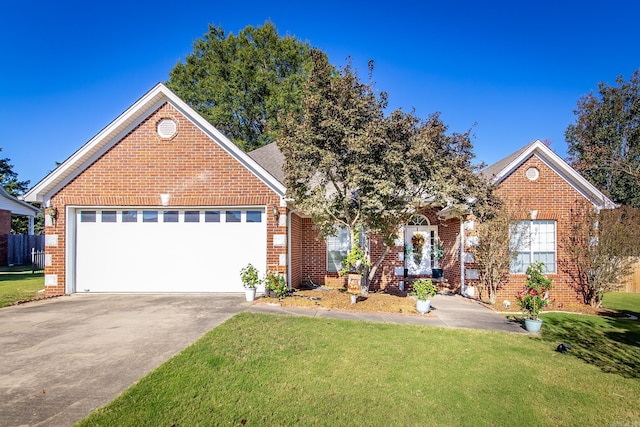 view of front facade featuring concrete driveway, brick siding, an attached garage, and a front lawn