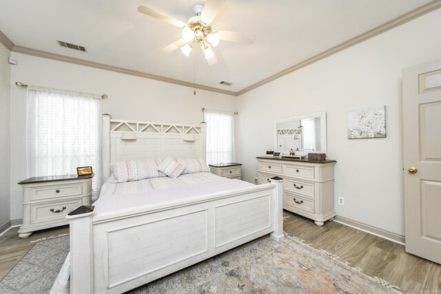 20 N Gettysburg, Cabot, AR 72023 - bedroom with light wood-type flooring, crown molding, and visible vents