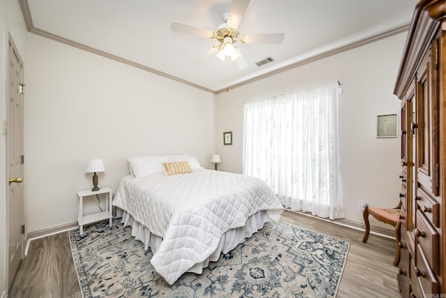 20 N Gettysburg, Cabot, AR 72023 - bedroom featuring baseboards, visible vents, ornamental molding, and wood finished floors