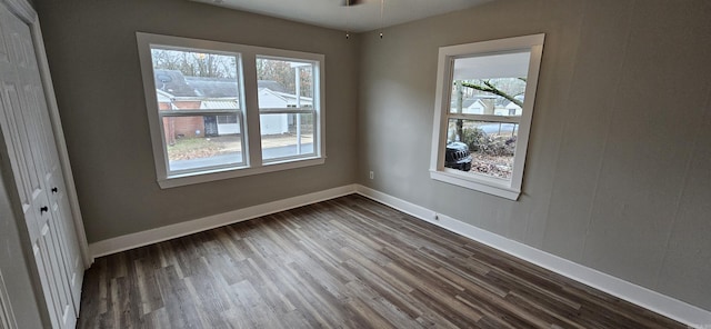 1620 S Harrison St, Little Rock, AR 72204 - spare room with dark wood-style floors, baseboards, and a ceiling fan