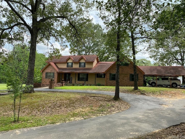 885 Mount Carmel Rd, Cabot, AR 72023 - view of front of property with a tiled roof and driveway