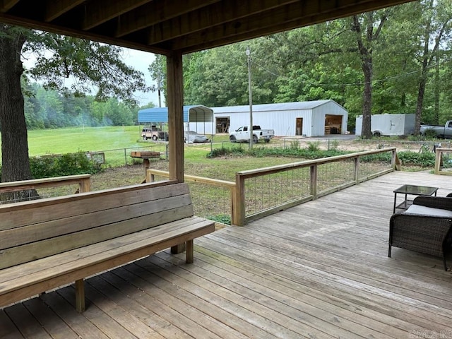 885 Mount Carmel Rd, Cabot, AR 72023 - wooden terrace with an outdoor structure, a yard, and a pole building