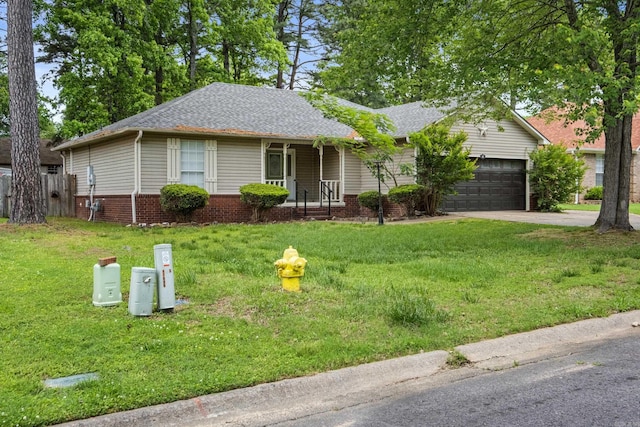 ranch-style house featuring a garage, a porch, driveway, and a front yard