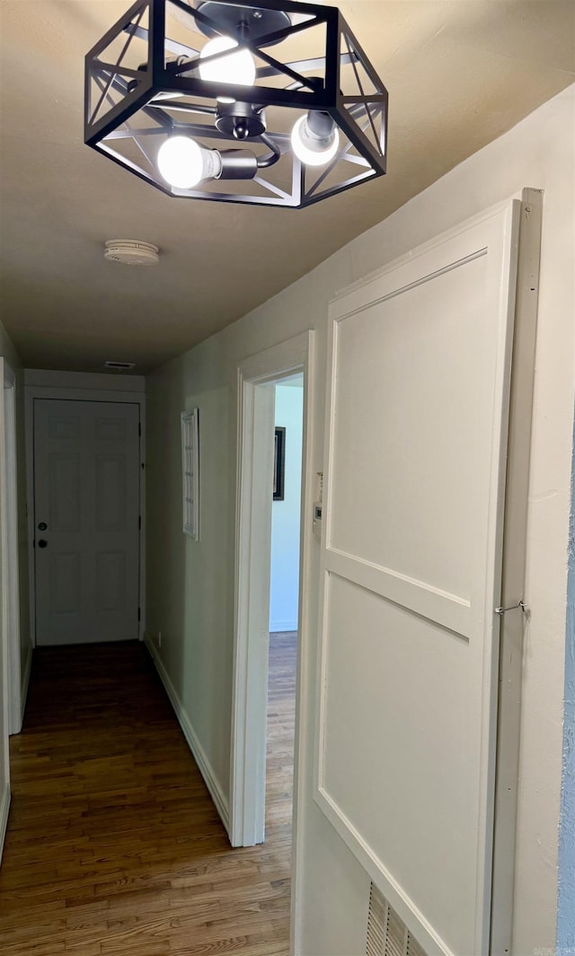 805 S St, Heber Springs, AR 72543 - corridor featuring baseboards and wood finished floors