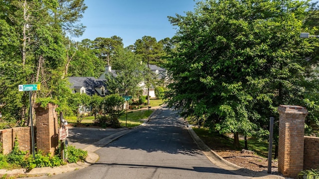 view of street featuring curbs