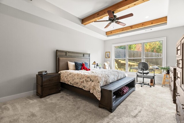 bedroom featuring ceiling fan, light carpet, beam ceiling, baseboards, and visible vents